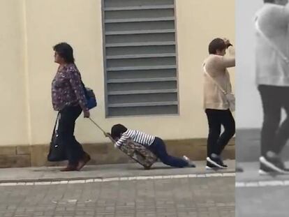 En vídeo, la escena de una mujer arrastrando a un niño sobre una mochila.