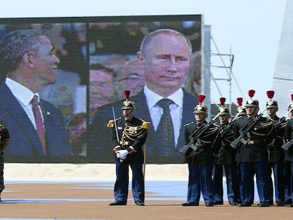 Obama y Putin en la celebración del Día D. FOTO: S. LOEB (AFP) / VÍDEO: ATLAS