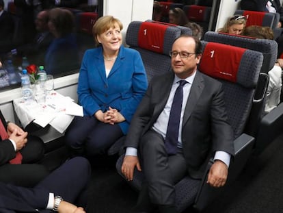 Tren en el túnel de San Gotardo. De izquierda a derecha: el primer ministro de Italia, Matteo Renzi; el presidente suizo, Johann Schneider-Ammann; la canciller alemana, Angela Merkel, y el presidente francés, François Hollande.