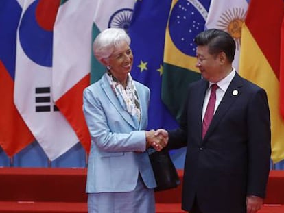 Lagarde, directora gerente del FMI, con el presidente Xi este lunes.