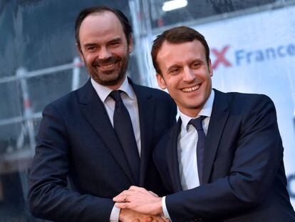 Emmanuel Macron y Edouard Philippe en 2016 en la localidad de Saint-Nazaire. LOIC VENANCE/ AFP.