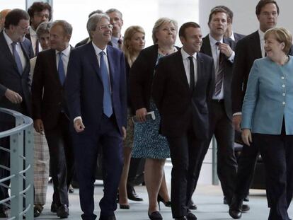 Los líderes europeos convocados este jueves en Berlín acuden a la rueda de prensa.