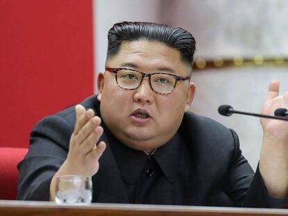 Kim Jong-un, en el Comité Central del Partido de los Trabajadores en diciembre, en una fotografía distribuida por la agencia estatal KCNA. En vídeo, imágenes difundidas por la televisión estatal.