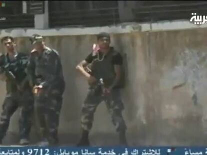 Imágenes de la televisión estatal siria sobre los enfrentamientos en Damasco.