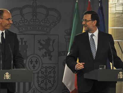 Rajoy (derecha) y Letta, durante su comparecencia. / DOMINIQUE FAGET (AFP)