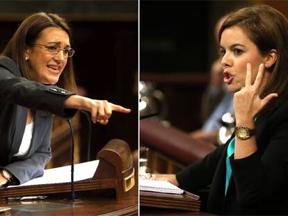 Soraya Rodríguez (izquierda) y Soraya Sáenz de Santamaría, en el debate de ayer en el Congreso de los Diputados.