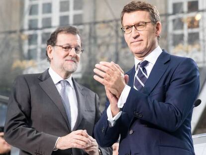 FOTO: Rajoy y Feijóo, durante la celebración en el Obradoiro tras la toma de posesión. / VÍDEO: Toma de posesión del presidente de la Xunta.