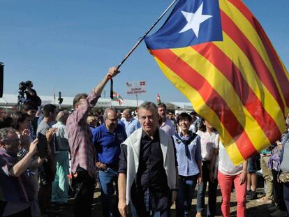 El lehendakari Urkullu, recibido con una 'estelada' en el Alderdi Eguna del PNV, este domingo en Vitoria. / En vídeo, declaraciones de los líderes del PNV (ATLAS).