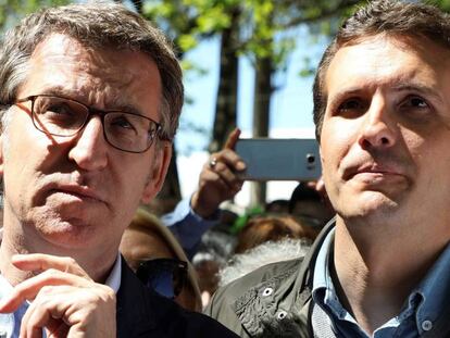 El presidente del PP, Pablo Casado, junto al presidente gallego, Alberto Núñez Feijóo, el pasado sábado en una romería en Galicia.