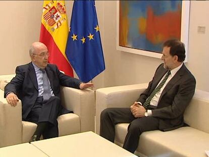 Almunia insiste tras hablar con Rajoy en sus propuestas sobre los bancos