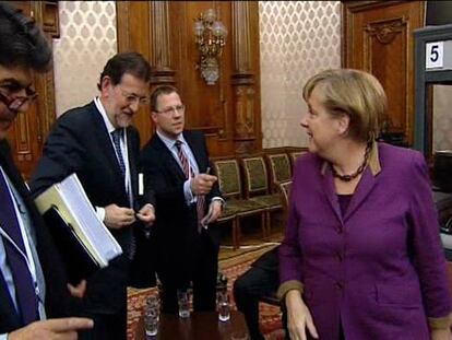 Rajoy exige ante Merkel cumplir los acuerdos del Consejo Europeo