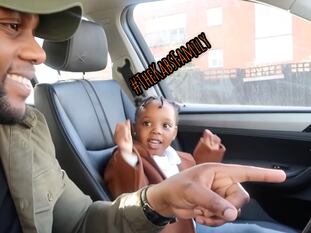 Mali Kabs singing with her father in the car.