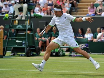 Ferrer devuelve una bola ante Dodig.