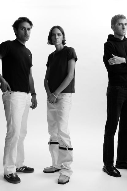 Kevin Tekinel and Charles Levai, founders of the Maybe agency, together with the music producer Clara 3000, wear Coperni.