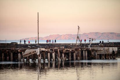 People walking on the dock of the port of Santa Rosalía, in Baja California Sur, Mexico.