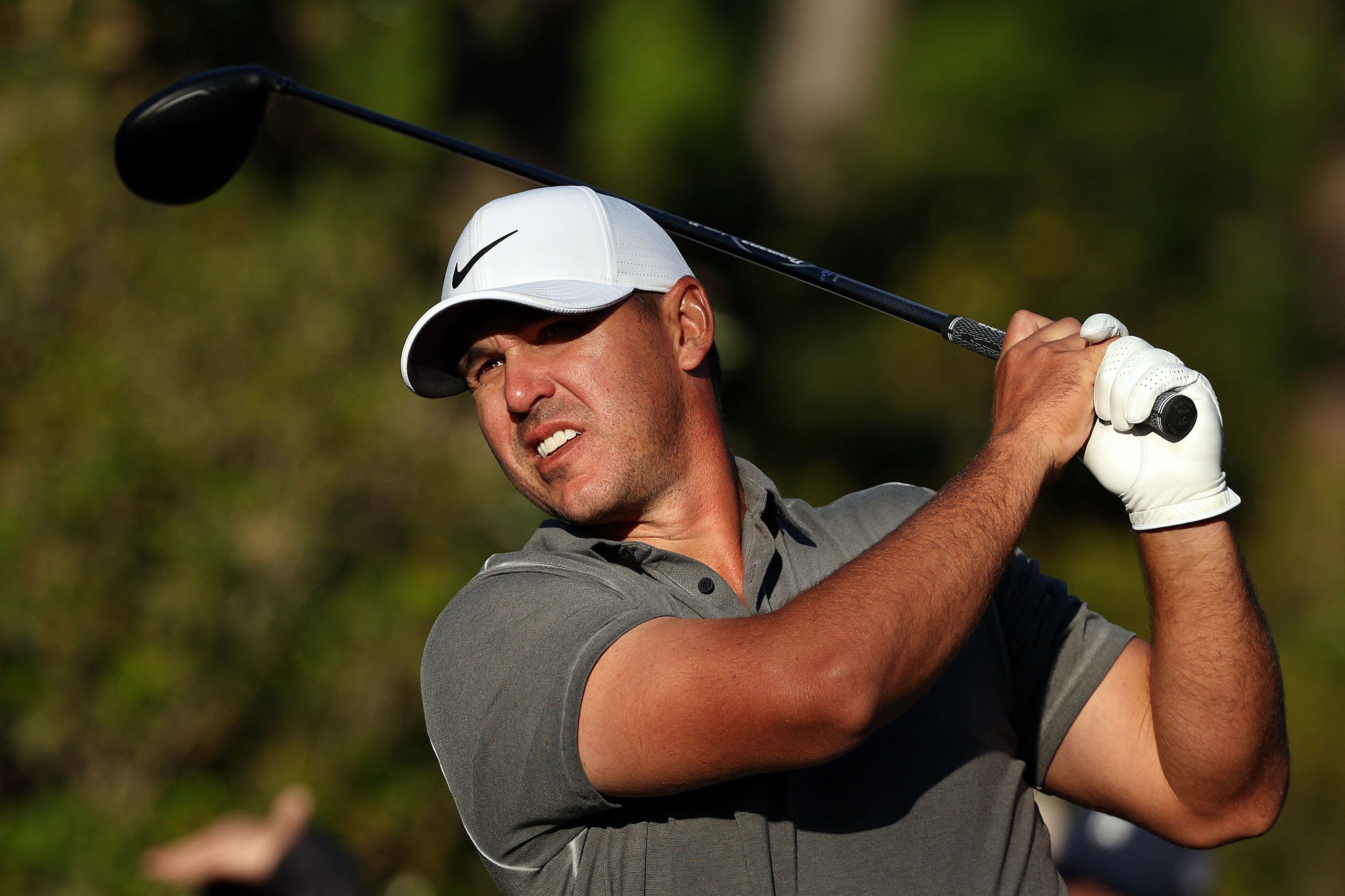 AUGUSTA, GEORGIA - APRIL 09: Brooks Koepka of the United States plays his shot from the 15th tee during the final round of the 2023 Masters Tournament at Augusta National Golf Club on April 09, 2023 in Augusta, Georgia.   Christian Petersen/Getty Images/AFP (Photo by Christian Petersen / GETTY IMAGES NORTH AMERICA / Getty Images via AFP)