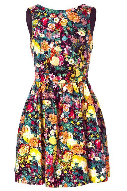 Zara te propone este colorido vestido lady (39,95 euros).