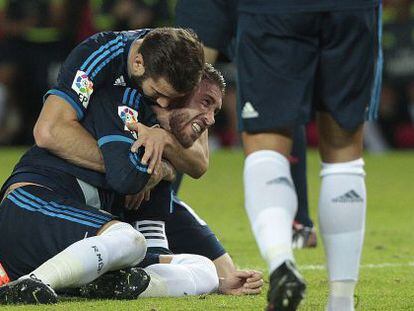 Nacho celebra con Ramos su gol contra el Sevilla.