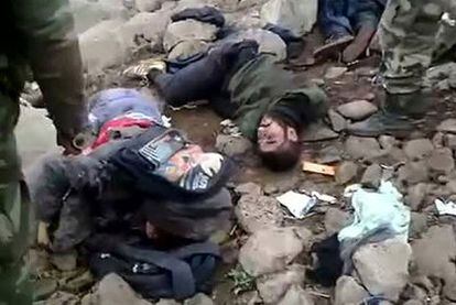 Captura de un vídeo que muestra varios cadáveres, supuestas víctimas del Ejército, en Rastan (centro).