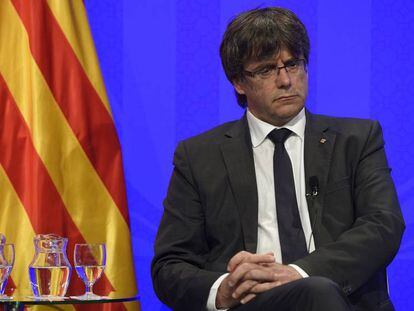 El presidente de la Generalitat, Carles Puigdemont, este domingo. En vídeo, declaraciones de la CUP.