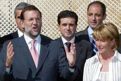 De izquierda a derecha: Mariano Rajoy, Jaume Matas, Francisco Camps y Esperanza Aguirre, en un acto del PP en Madrid en 2003.
