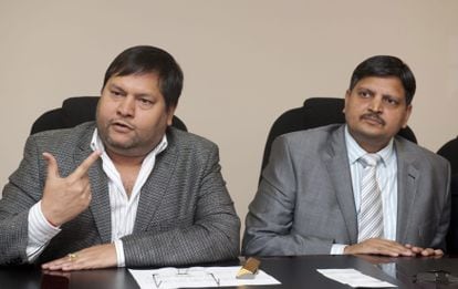 Ajay Gupta, right, and his brother Atul, during an interview in Johannesburg in 2011.
