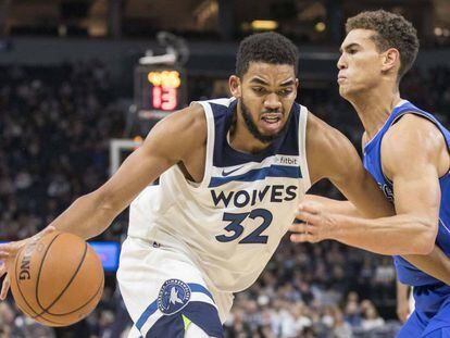 Towns y Powell en un Minnesota-Dallas.