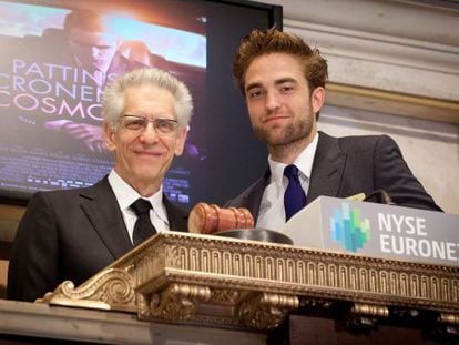 El actor Robert Pattinson y el director David Cronenberg en Wall Street