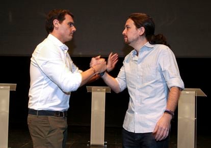 Albert Rivera and Pablo Iglesias greet each other before a debate in November 2015.