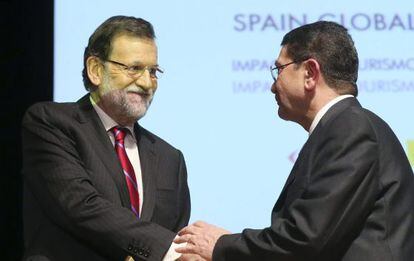 Rajoy, junto al secretario general de la OMT, Taleb Rifai,en el foro Spain Global Tourism F&oacute;rum, celebrado en Madrid.  