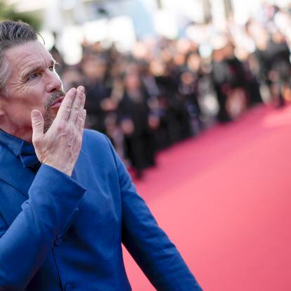 Ethan Hawke poses for photographers upon arrival at the premiere of the film 'Triangle of Sadness' at the 75th international film festival, Cannes, southern France, Saturday, May 21, 2022. (AP Photo/Daniel Cole)