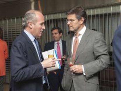 Juli&aacute;n N&uacute;&ntilde;ez, presiente de Seop&aacute;n, ayer con el secretario de Estado de Infraestructuras, Rafael Catal&aacute;, durante un acto de la APIE.