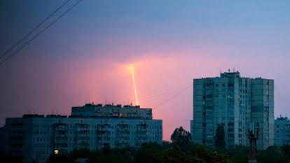 A Russian rocket launched toward Ukraine from Russia's Belgorod region is seen at dawn in Kharkiv, Ukraine, Thursday, Aug. 11, 2022. (AP Photo/Vadim Belikov)