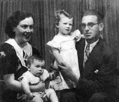 Alejandra Pizarnik on the lap of her mother, Rosa, next to her father, Elías, who is holding her sister, Myriam.  The image comes from the family album donated by the poet's sister. 