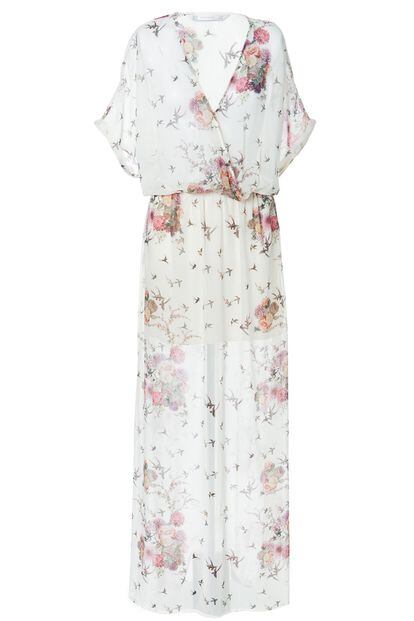 Vestido de escote en V de inspiración oriental de Zara (49,95 euros).
