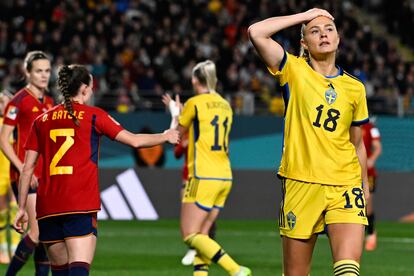Swedish Fridolina Rolfo laments after losing a miss on goal.