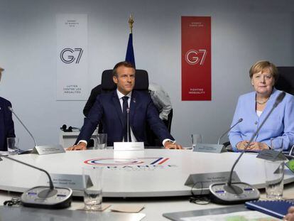 El presidente de EE UU, Donald Trump; e presidente francés, Emmanuel Macron, y la canciller alemana, Angela Merkel 