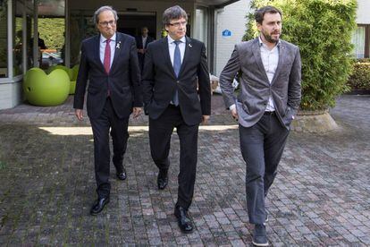 El president de la Generalitat, Quim Torra, amb Carles Puigdemont i Toni Comín a l'hotel Côte Vert de Waterloo.