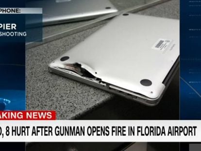 Imagen del portátil que paró la bala, en la CNN.