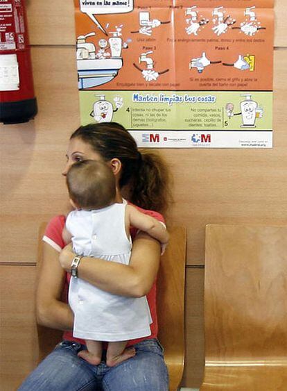 Cartel contra la gripe en un centro de salud madrileño.