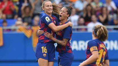 Graham Hansen y Jenni Hermoso celebran un gol del Barcelona.