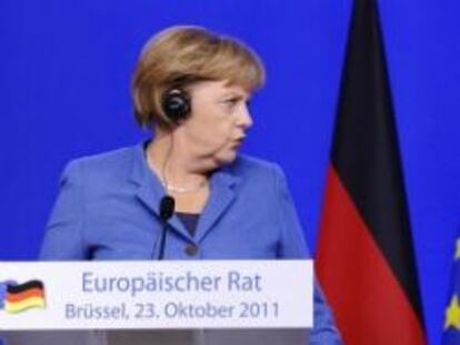 Angela Merkel y Nicolas Sarkozy, en la rueda de prensa celebrada.