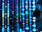 Genetic Research, scientist viewing DNA information on screens
