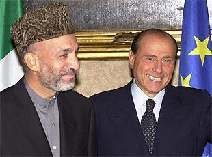 Hamid karzai y el primer ministro italiano, Silvio Berlusconi, en Roma.