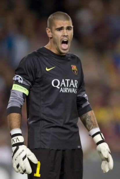 Víctor Valdés, en un partido con el Barça.