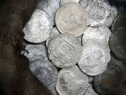 Parte de las monedas del tesoro de Nuestra se&ntilde;ora de las Mercedes que se expone en Cartagena. 