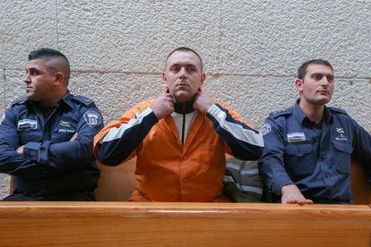 Roman Zadorov, en el centro, durante una audiencia de su juicio en el Tribunal Supremo, en Jerusalén