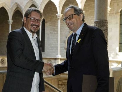 El presidente Quim Torra y el líder de los comunes, Xavier Domènech, este mediodía en la Generalitat