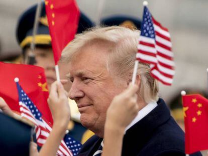 Trump, este miércoles a su llegada a China.