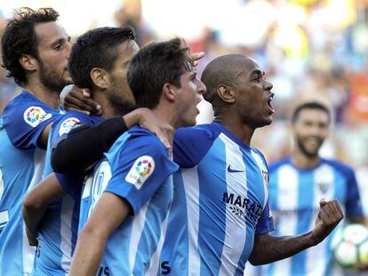 Rol&aacute;n celebra uno de sus dos goles. 